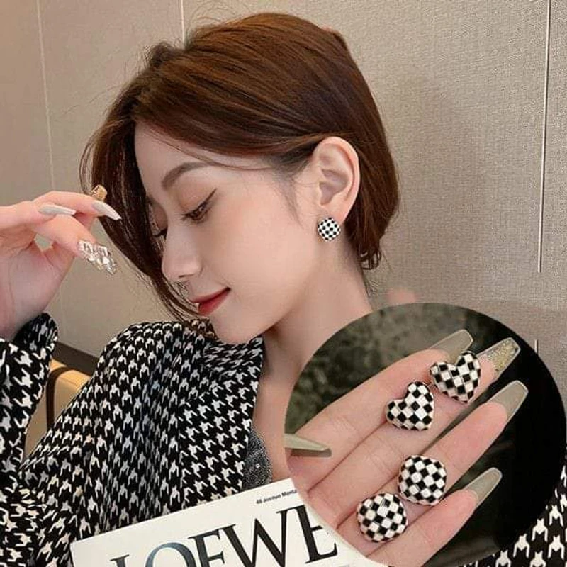 Black Chanel style earrings