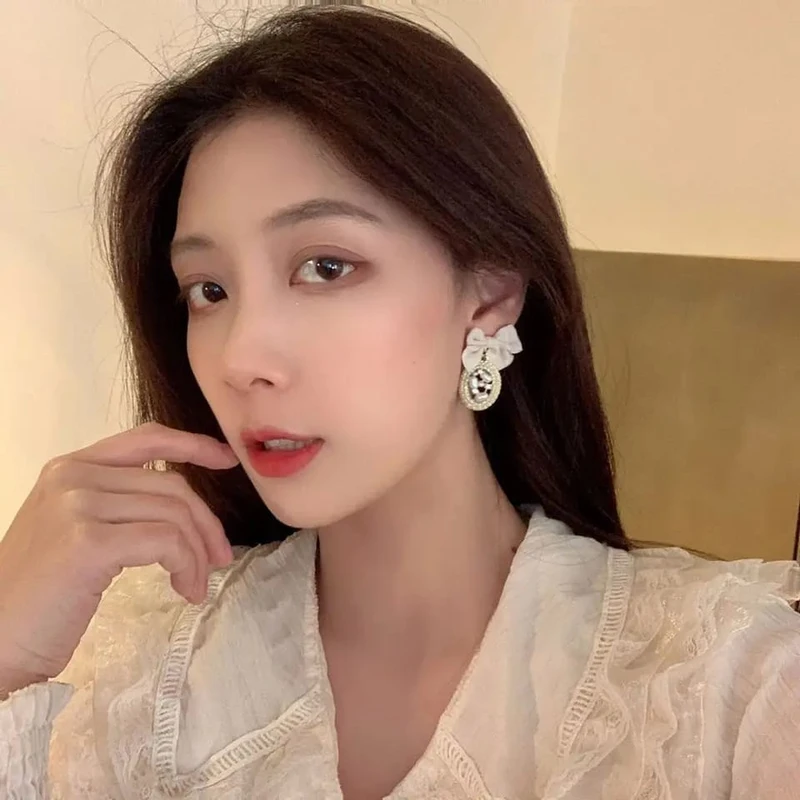Black Chanel style earrings