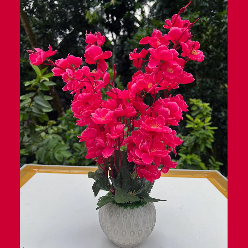 Cherry Blossom Flower in Plastic Vase Red