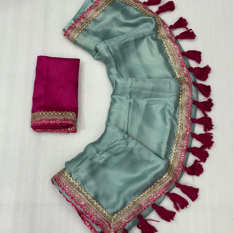 Trending Georgette Tissue Saree with fancy lace border