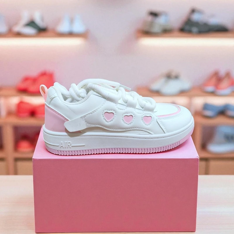 212 - White Sneakers with Heart-Shaped Cutouts and Trendy Design—Perfect for a Chic Look