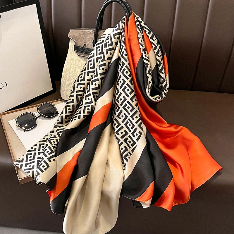 Glossy black & orange mixed printed  silk hijab
