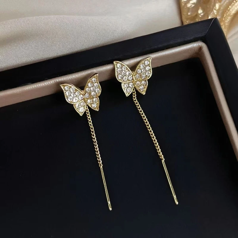 Beautiful golden color butterfly tassel earrings
