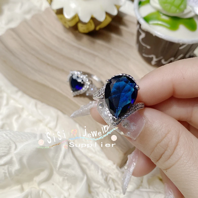 Pear Cut Blue Topaz Ring with Diamond Accents - Thumbnail 3
