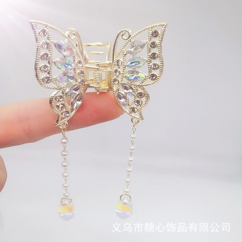 Multicoloured butterfly tassel claw clip