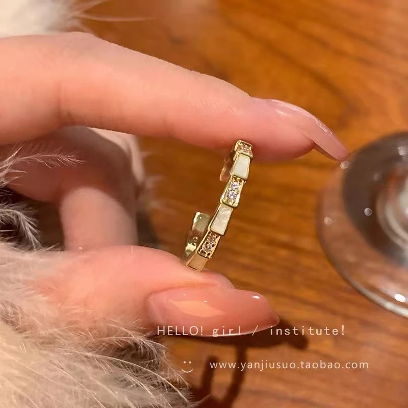 Pretty golden color crystal adjustable ring