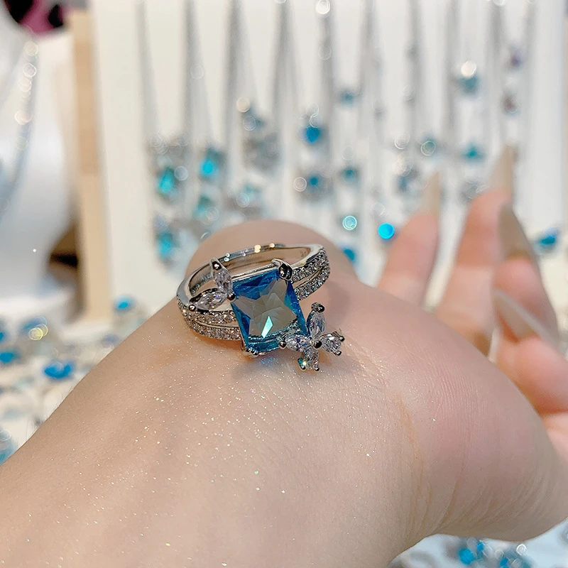 Emerald cut blue cubic zirconia ring