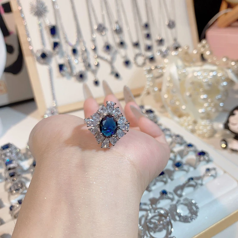 Exquisite cluster design blue sapphire ring