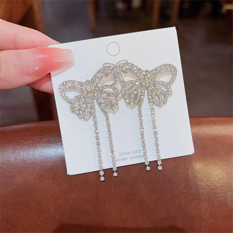 Beautiful silver color shiny tassel earrings