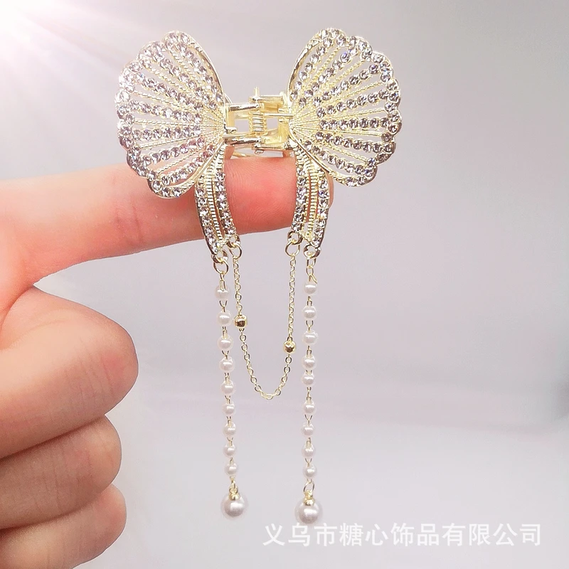 Elegant white color butterfly tassel claw clip