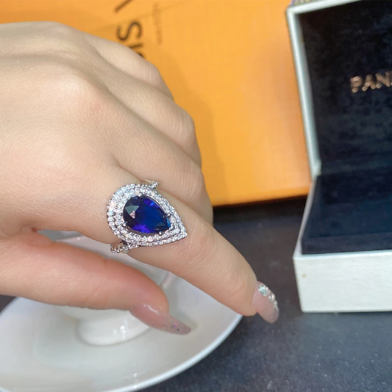 Pear-shaped Blue Sapphire Halo Ring. - Thumbnail 3