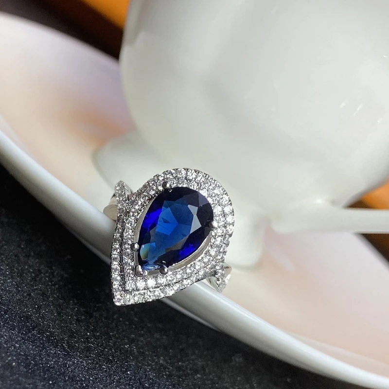 Pear-shaped Blue Sapphire Halo Ring. - Thumbnail 4