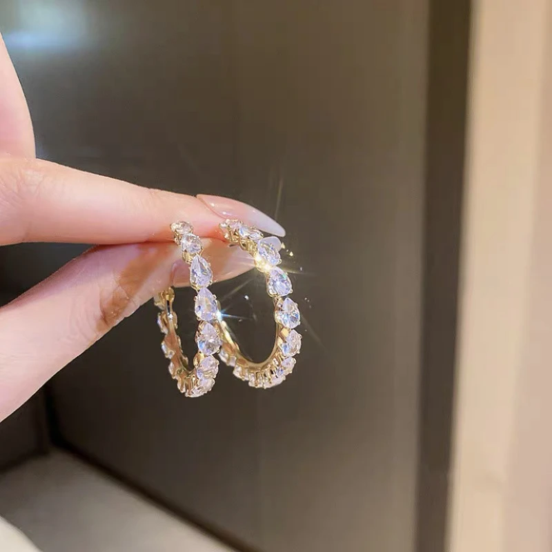 Sophisticated white hoop women's earrings