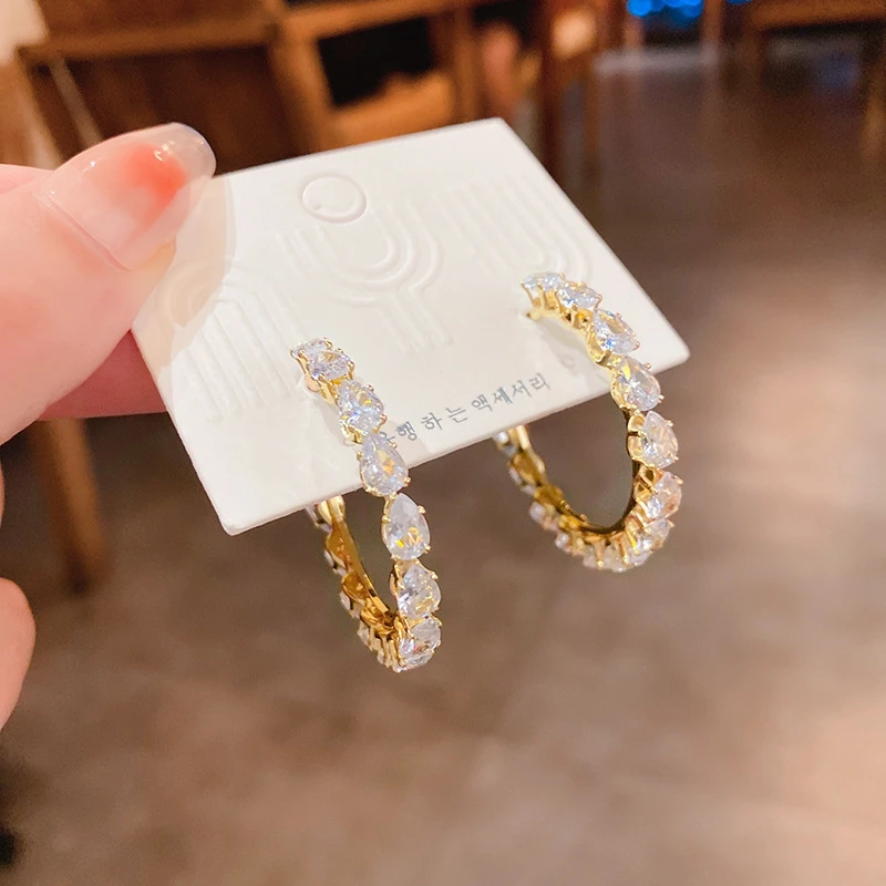 Sophisticated white hoop women's earrings