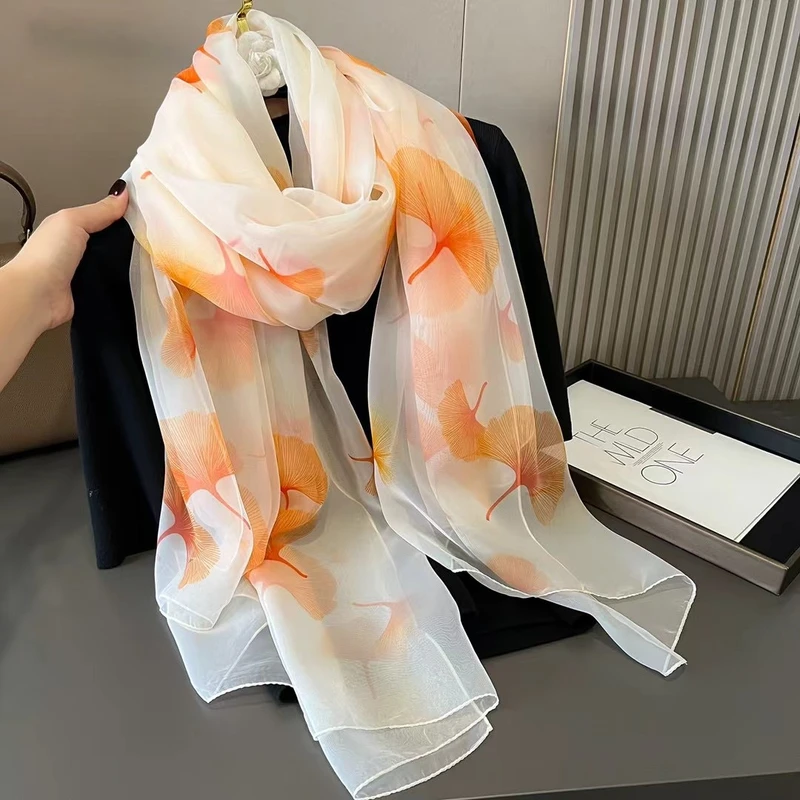 Light orange color floral pattern silk scarf / hijab