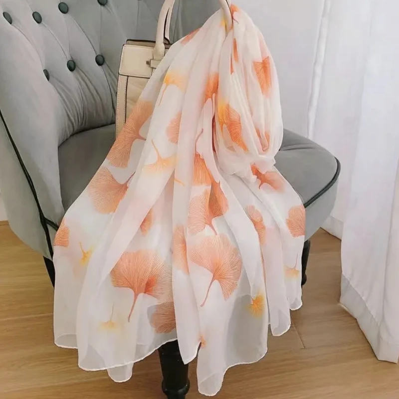 Light orange color floral pattern silk scarf / hijab