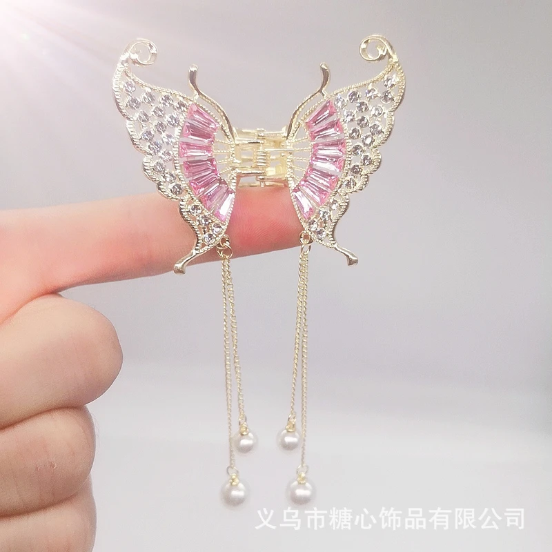 Pretty pink color tassel claw clip