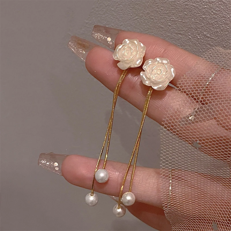 Beautiful white camelia tassel earrings