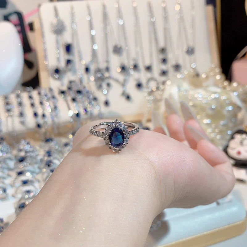 Halo sapphire blue ring
