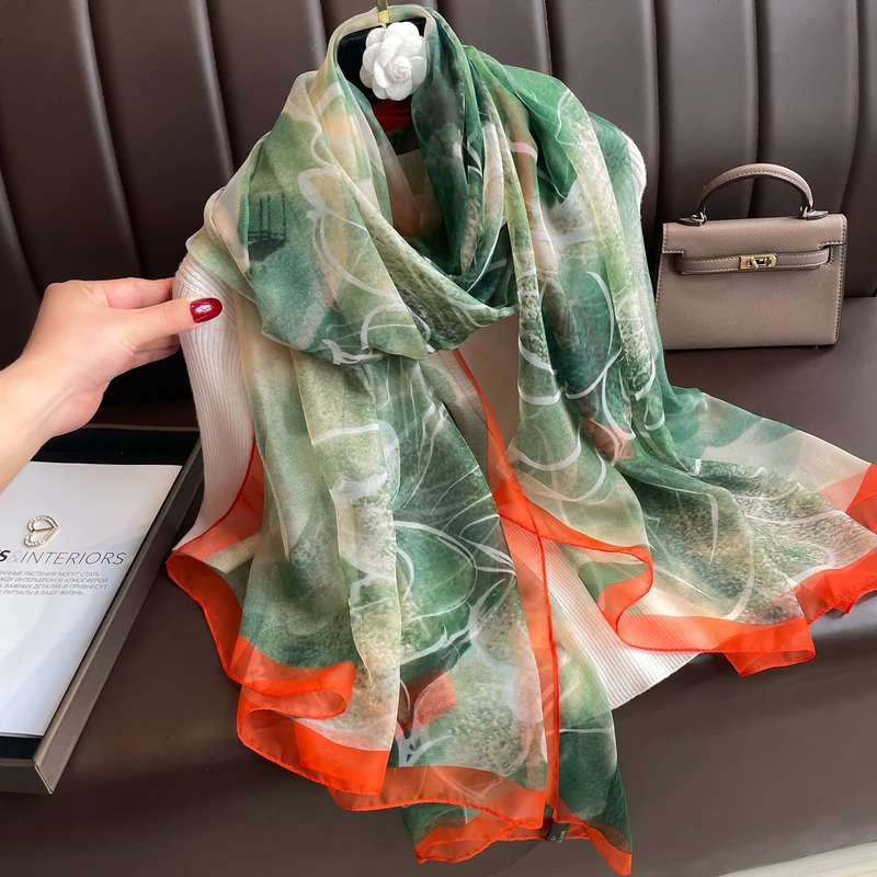 Classy green silk scarf with orange color border