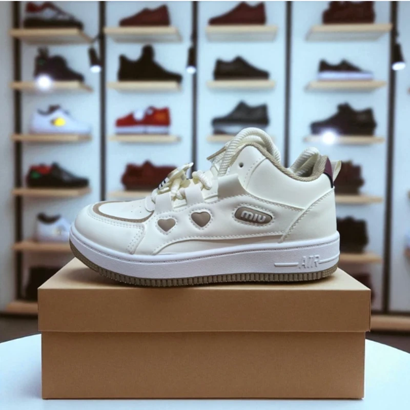 215-Brown Sneakers with Heart-Shaped Cutouts and "MIU" Branding—Chic & Playful Casual Footwear