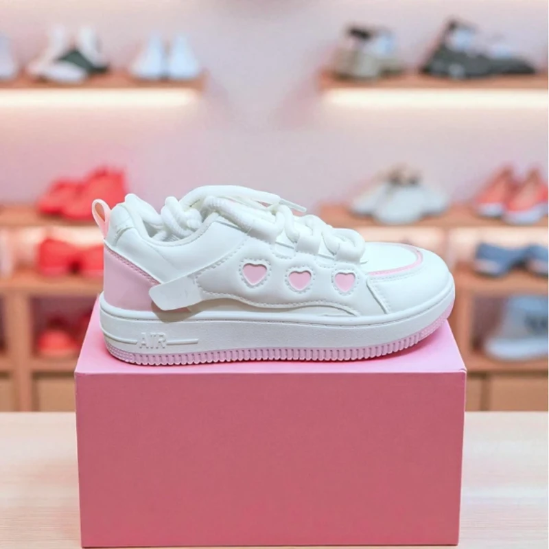 212 - Pink Sneakers with Heart-Shaped Cutouts and Trendy Design—Perfect for a Chic Look